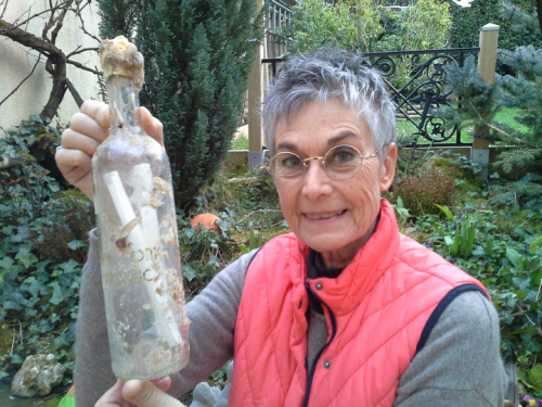 Brigitte Barthelemy with Mr. Boorujy's bottle.