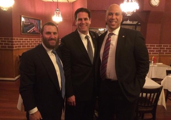 Rabbi Shmuley Boteach, Israeli Ambassador to the U.S. Ron Dermer and Senator Cory Booker out to eat at the famed Eli’s kosher restaurant in Northwest DC in 2013.