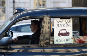 An Uber driver protests in London. (Photo: Twitter)