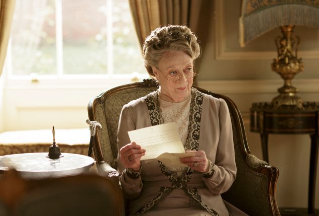 Downton Abbey Part Five- Sunday,  January 31, 2016 at 9pm ET on MASTERPIECE on PBS Thomas makes Andy a generous offer. Spratt rescues Denker. A powerful politician comesto dinner. Robert upsets the family. Mary gets suspicious.   Shown: Maggie Smith as Violet, Dowager Countess of Grantham   (C) Nick Briggs/Carnival Film & Television Limited 2015 for MASTERPIECE   This image may be used only in the direct promotion of MASTERPIECE CLASSIC. No other rights are granted. All rights are reserved. Editorial use only. USE ON THIRD PARTY SITES SUCH AS FACEBOOK AND TWITTER IS NOT ALLOWED.
