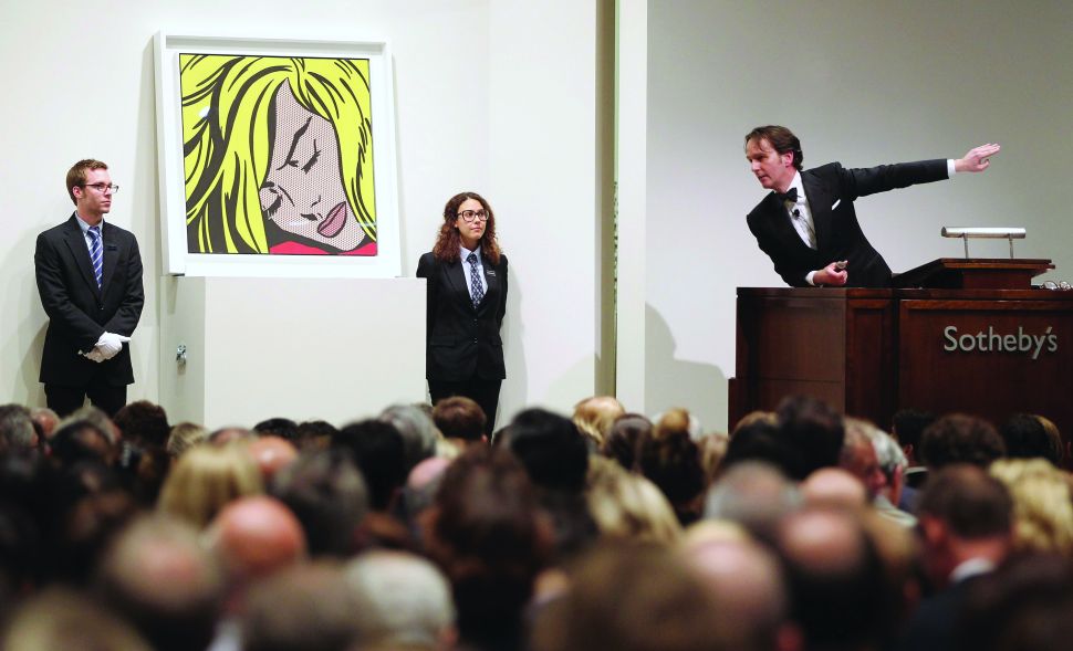 NEW YORK, NY - MAY 09: Roy Lichtenstein’s ‘Sleeping Girl’ is auctioned at Sotheby's on May 9, 2012 in New York City. The market for contemporary art has been on fire in recent months with Edvard Munch's "The Scream" posting an auction record of $119 million at Sotheby's on May 2. (Photo by Mario Tama/Getty Images)