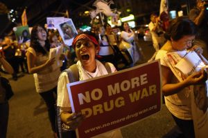 Protesters call for an end to the War on Drugs.