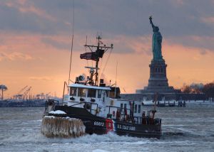 NEW YORK - JANUARY 28: In this handout image provided by the U.S. Coast Guard, the Coast Guard Cutter Wire, a 65-foot icebreaking tug homeported in Saugerties, New York makes its way through an ice flow January 28, 2004 in New York Harbor. As severe ice conditions still exist in the Northeast, U.S. Coast Guard ice breakers have been working continuosly keeping waterways open for maritime traffic. (Photo by Mike Lutz/USGC via Getty Images)