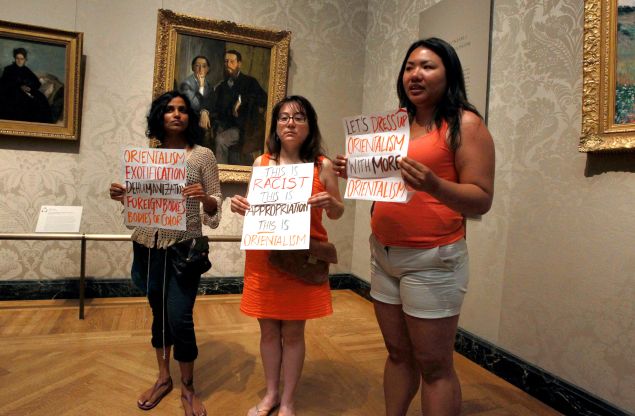 Protesters objected to the MFA's "Kimono Wednesday" event, where the museum invited visitors to try on a replica kimono in front of Claude Monet's "La Japonaise." The museum had kimonos for people to try on and pose as Camille Monet did in the painting. (Photo John Blanding/The Boston Globe via Getty Images)