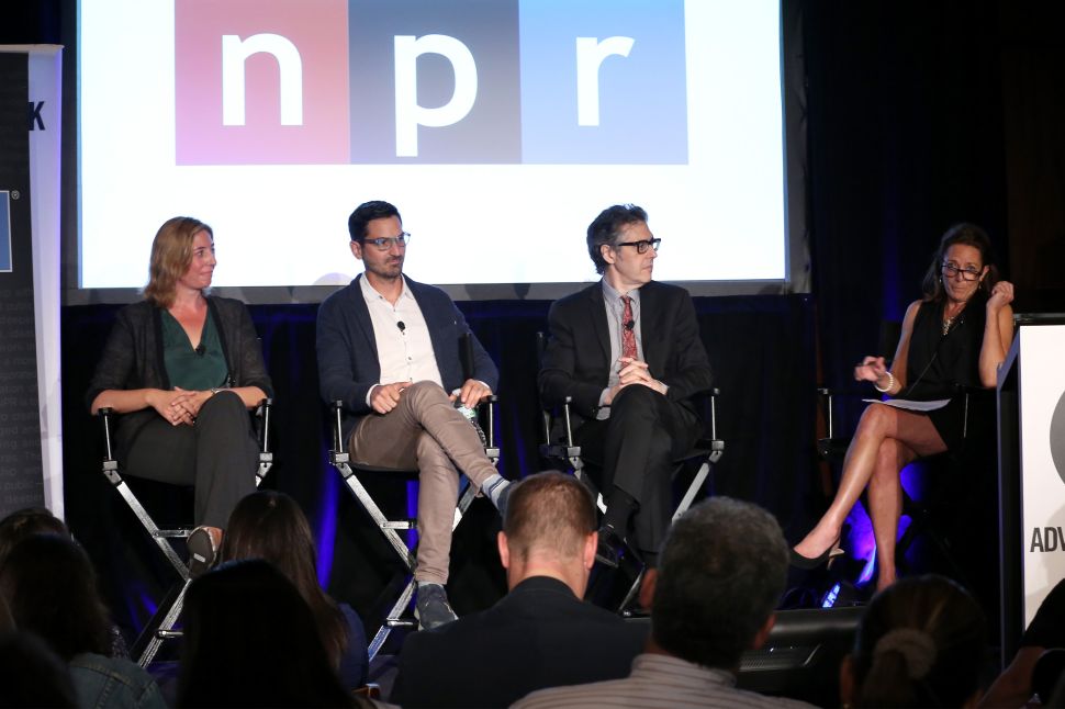 NEW YORK, NY - SEPTEMBER 28: (L-R) Host and Senior Tech Correspondent for Marketplace Molly Wood, Host and Editorial Director TED Radio Hour Guy Raz, Creator and Host This American Life Ira Glass, and President and CEO National Public Media Gina Garrubbo speak onstage at the The On Demand Audio and Podcast Revolution: Building Passionate Audiences And Great Resonance For Brands panel during Advertising Week 2015 AWXII at Lucille's at B.B. King Blues Club and Grill on September 28, 2015 in New York City. (Photo by Paul Zimmerman/Getty Images for AWXII)