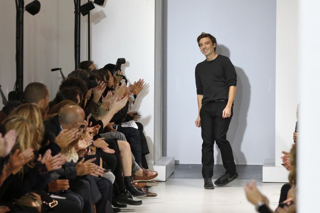 Designer Julien Dossena takes a bow at the Spring/Summer 2016 Paco Rabanne show