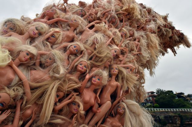 A sculpture made from galvanised iron, aluminium and plastic by artist Annette Thas is displayed at the "Sculpture by the Sea" exhibition which runs along the Bondi to Tamarama coastal walk in Sydney on October 22, 2015. The world's largest annual free-to-the-public outdoor sculpture exhibition runs from October 22 - November 8 this year and features over 107 sculptures by artists around the world. AFP PHOTO / Saeed Khan RESTRICTED TO EDITORIAL USE, MANDATORY MENTION OF THE ARTIST UPON PUBLICATION, TO ILLUSTRATE THE EVENT AS SPECIFIED IN THE CAPTION / AFP / SAEED KHAN (Photo credit should read SAEED KHAN/AFP/Getty Images)