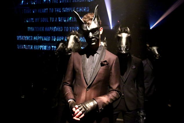 Tuxedo jackets and obscure face masks (Photo: Getty Images).
