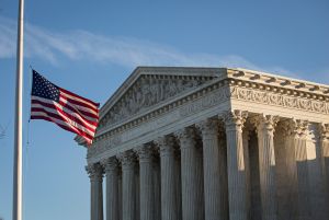 WASHINGTON, DC - FEBRUARY 14: An American flag flies at half mast following the death of Supreme Court Justice Antonin Scalia at the U.S. Supreme Court, (Drew Angerer/Getty Images)