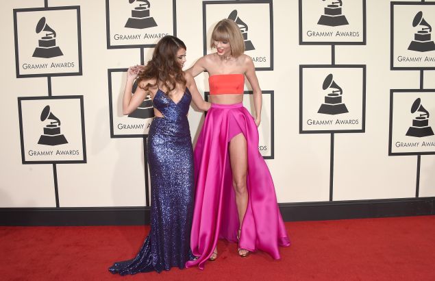 LOS ANGELES, CA - FEBRUARY 15: Musicians Selena Gomez (L) and Taylor Swift attend The 58th GRAMMY Awards at Staples Center on February 15, 2016 in Los Angeles, California.