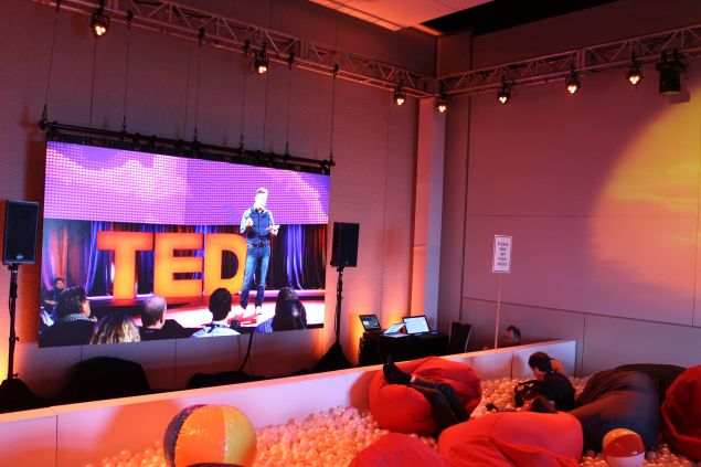 TED attendees watch a live-stream of the conference from bean-bag chairs in a pool filled with balls on February 16, 2016 in Vancouver. The global TED Conference features speakers on trends, challenges and innovations shaping the world.