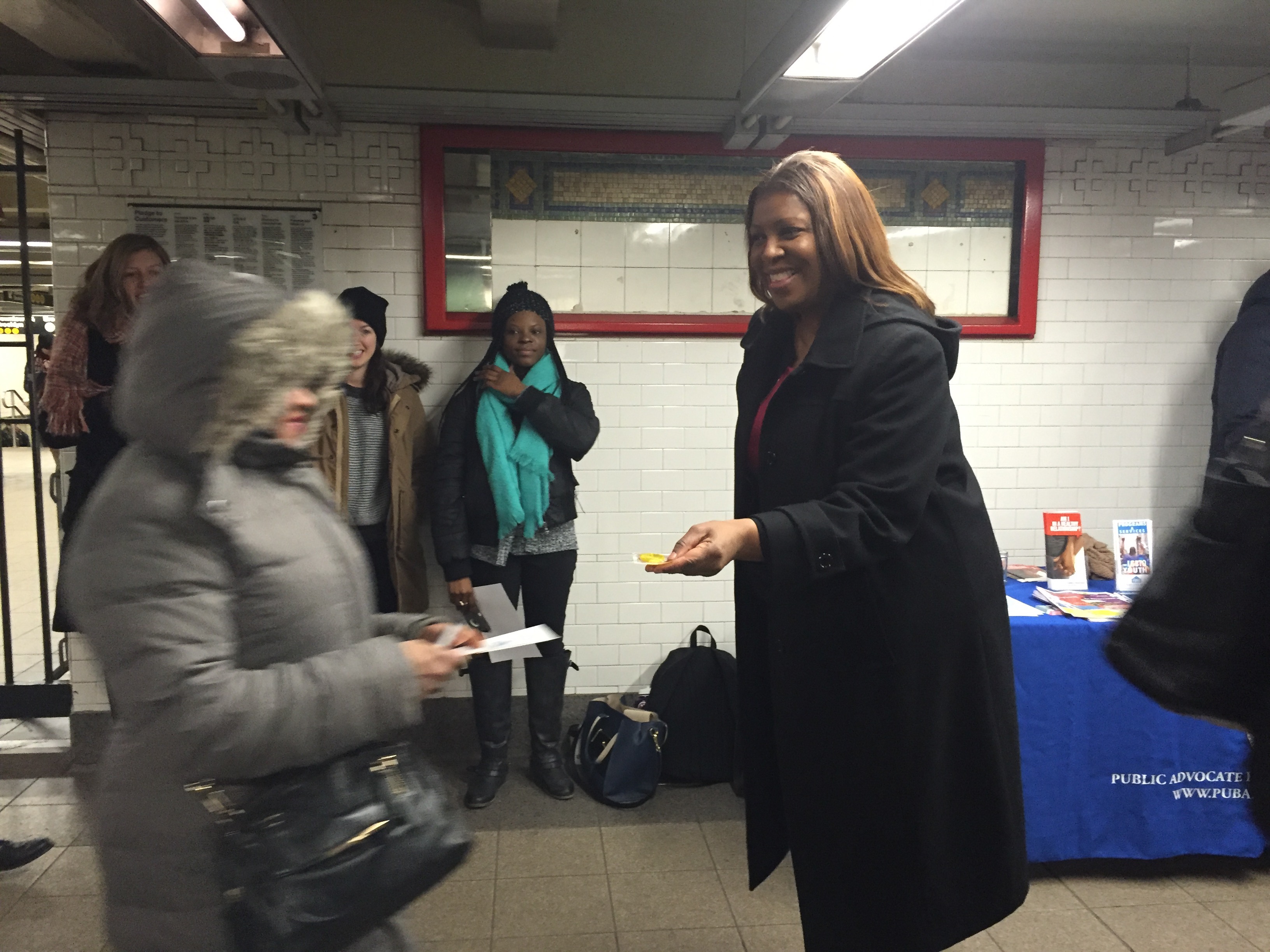 Public Advocate Letitia James hands out free condoms in the Union Square subway station. (Photo: Jillian Jorgensen for Observer)