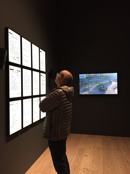 A visitor to Laura Poitras' "Astro Noise" at the Whitney Museum. (New York Observer)