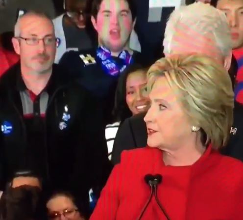 Sticker Guy at Iowa Clinton rally. (Photo: Screenshot via Twitter/LizzLocker)