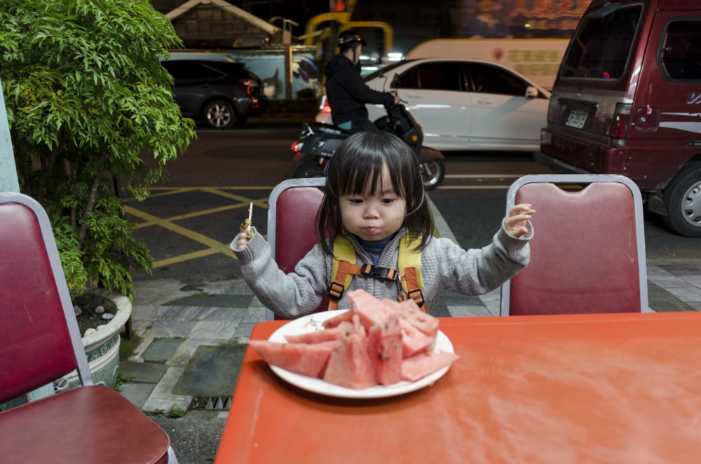 Little Chow loves her watermelon. Just like her father.