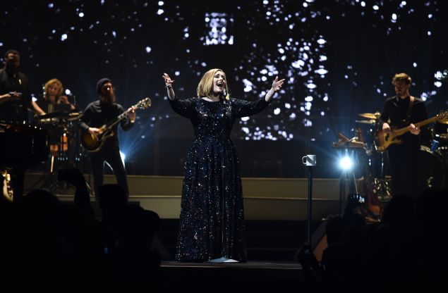 Adele performing in her Burberry dress