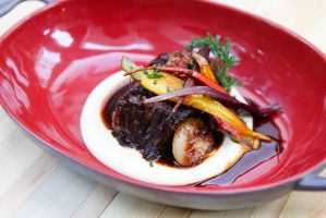 Slow Braised Beef Short Ribs prepared by Chef Dakota Weiss.