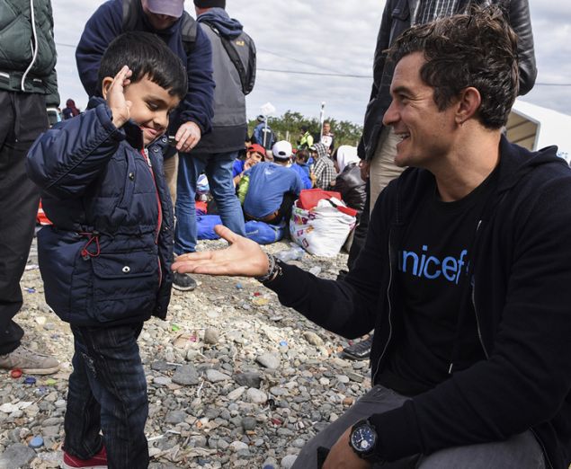 Orlando Bloom visiting a refugee camp in Macedonia in 2015.