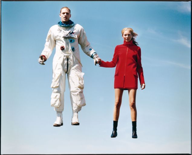 A model and an astronaut in a surreal moment of suspension that was shot for (but never ran in) Vogue magazine in 1998. 