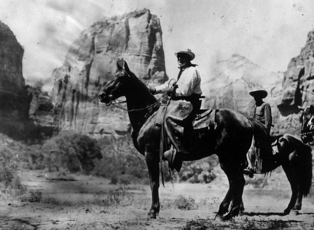 July 1923: 29th president of the United States Warren Gamaliel Harding (1865 - 1923) dressed as a cowboy for a presidential party in the West. 