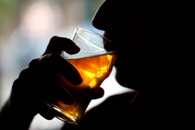 A Russian River Brewing Company customer takes a sip of the newly released Pliny the Younger triple IPA beer on February 7, 2014 in Santa Rosa, California. 