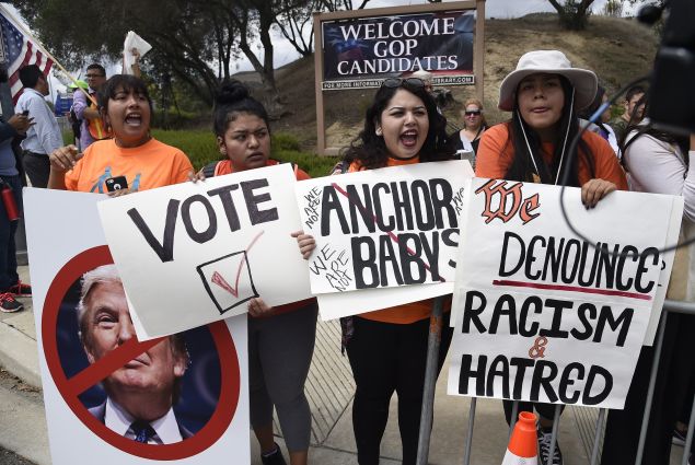 Supporters of immigration rights protest against Republican candidates at a debate last September. 