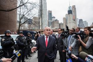 Police Commissioner Bill Bratton with NYPD officers and press.