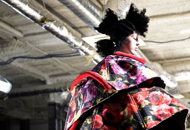 A model presents a creation by Comme Des Garcons during the 2016-2017 fall/winter ready-to-wear collection on March 5, 2016 in Paris.