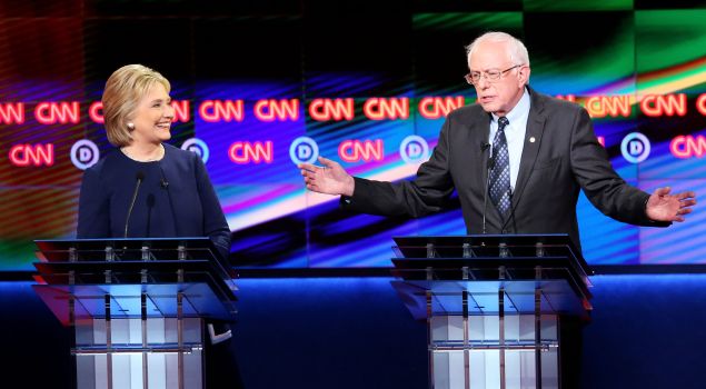 Former Secretary of State Hillary Clinton and Sen. Bernie Sanders debating in Flint on Sunday.