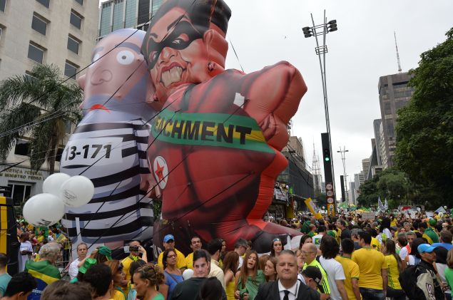 Demonstrators protest against Brazilian President Dilma Rousseff and the ruling Workers' Party (PT) at Paulista Avenue in Sao Paulo, Brazil on March 13, 2016. Hundreds of thousands of Brazilians angered by a giant corruption scandal and the crumbling economy flooded the streets Sunday to call for removal of President Dilma Rousseff. AFP PHOTO / NELSON ALMEIDA / AFP / NELSON ALMEIDA (Photo credit should read NELSON ALMEIDA/AFP/Getty Images)