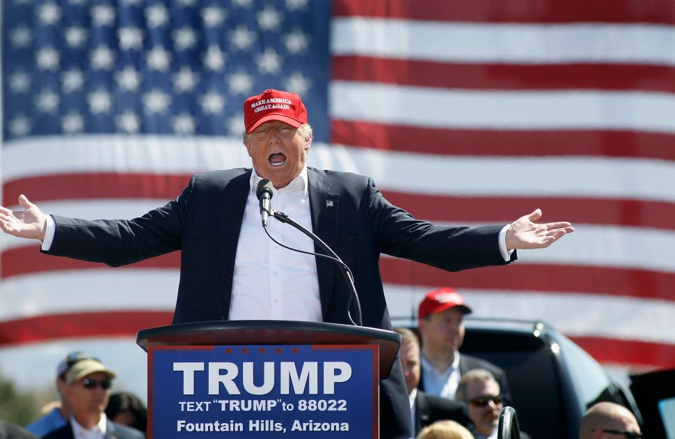 FOUNTAIN HILLS, AZ - MARCH 19: Republican presidential candidate Donald Trump speaks to guest gathered at Fountain Park during a campaign rally on March 19, 2016 in Fountain Hills, Arizona. Trumps visit to Arizona is the second time in three months as he looks to gain the GOP nomination for President. (Photo by Ralph Freso/Getty Images)