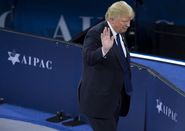 US Republican Presidential hopeful Donald Trump waves after addressing the American Israel Public Affairs Committee (AIPAC) 2016 Policy Conference at the Verizon Center in Washington, DC, March 21, 2016.