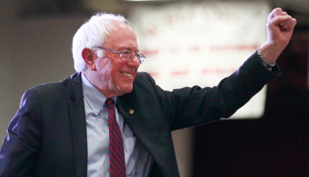 Democratic presidential candidate Bernie Sanders gives a fist pump after his speech at West High School at a campaign rally on March 21, 2016 in Salt Lake City, Utah. The Republican and Democratic caucuses are March 22.