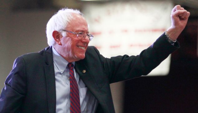 Democratic presidential candidate Bernie Sanders gives a fist pump after his speech at West High School at a campaign rally on March 21, 2016 in Salt Lake City, Utah. The Republican and Democratic caucuses are March 22. 