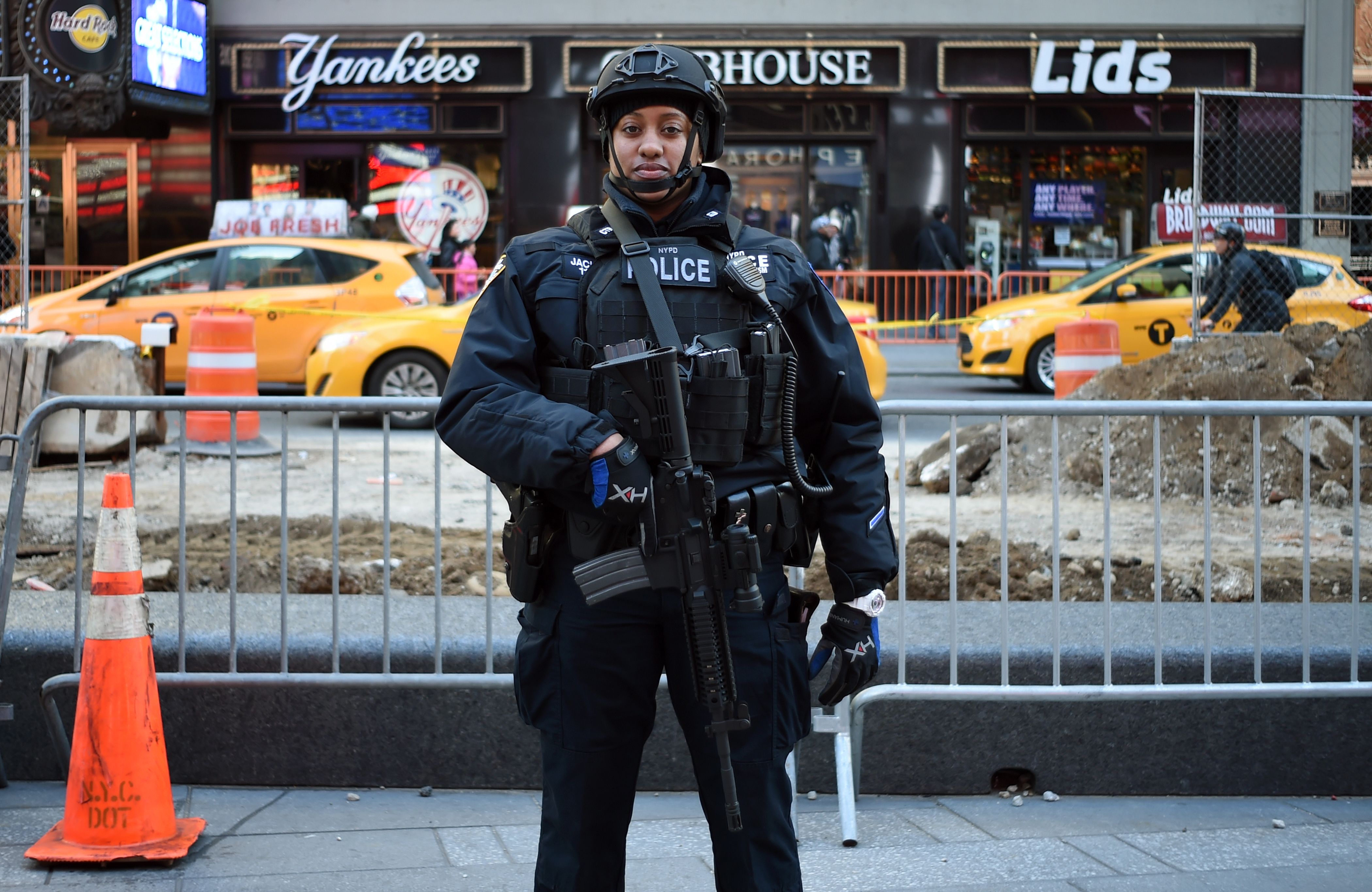 A New York Police Department (NYPD) officer patrols in Times Square on March 22, 2016, in New York.