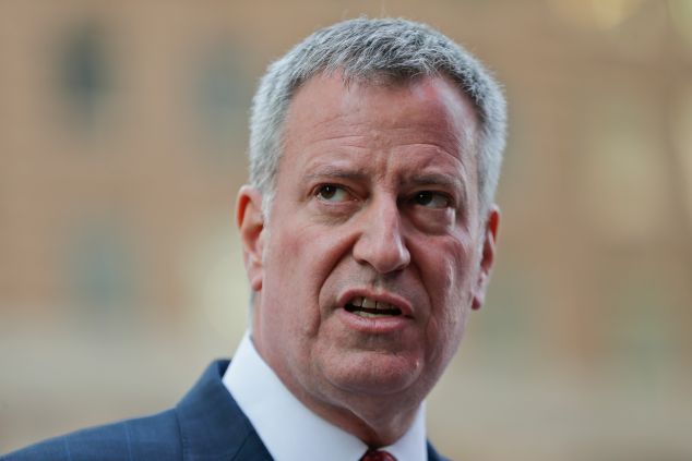 New York City Mayor Bill de Blasio speaks during a news conference in Times Square March 22, 2016 in New York City. Security was tightened in New York today after two explosions ripped through the Brussels, Belgium airport and a train station this morning killing at least 30 people. 