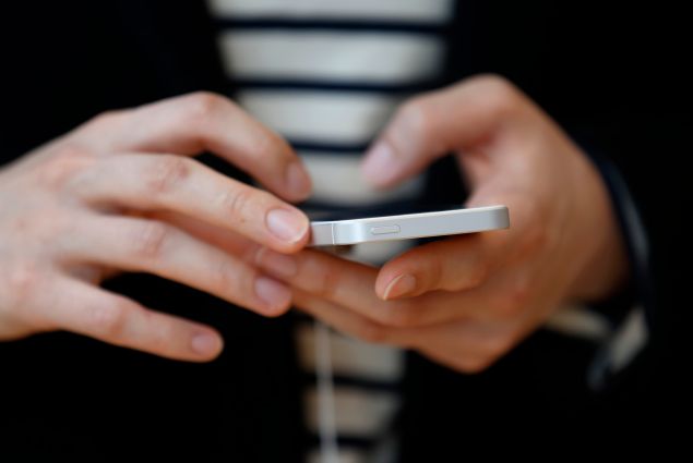 A customer tries an Apple Inc. iPhone SE at the company's Omotesando store on March 31, 2016 in Tokyo, Japan. Apple Inc. launched its iPhone SE and iPad Pro 9.7 inch on March 31, 2016 in Japan.