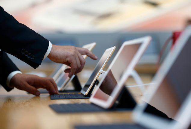 A customer tries an Apple Inc. iPad Pro 9.7 inch at the company's Omotesando store on March 31, 2016 in Tokyo, Japan. Apple Inc. launched its iPhone SE and iPad Pro 9.7 inch on March 31, 2016 in Japan.