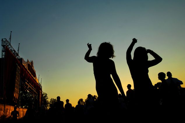 Partying down at Bonnaroo in our RFID wristbands, looking like an iPod silhouette