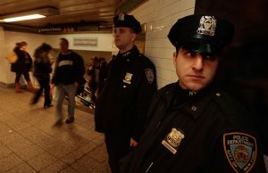 Heightened security on NYC subways due to the terrorist attacks in Brussels.