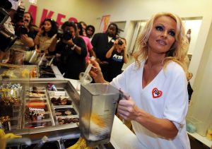 Pamela Anderson creates the first all-vegan shake at Millions of Milkshakes in West Hollywood, California in 2010.