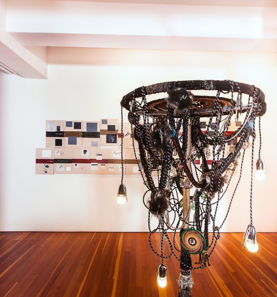 Paul Chan, American Genius, A Comedy by Lynne Tillman, (2012) and Haegue Yang, Bondage Bonsai, (2012) in the dining area.