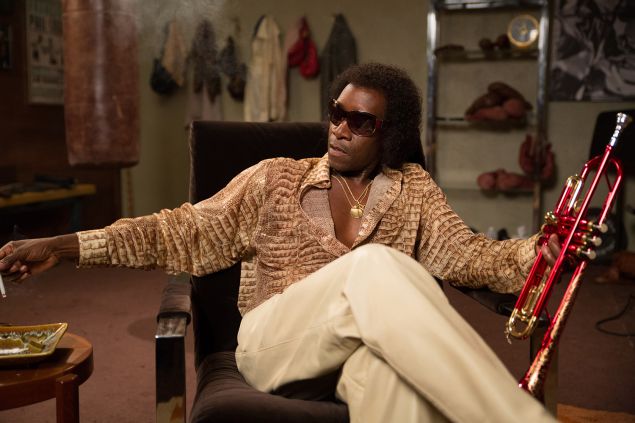 Don Cheadle as Miles Davis.
