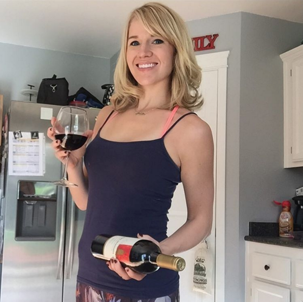 April Storey, working out with wine