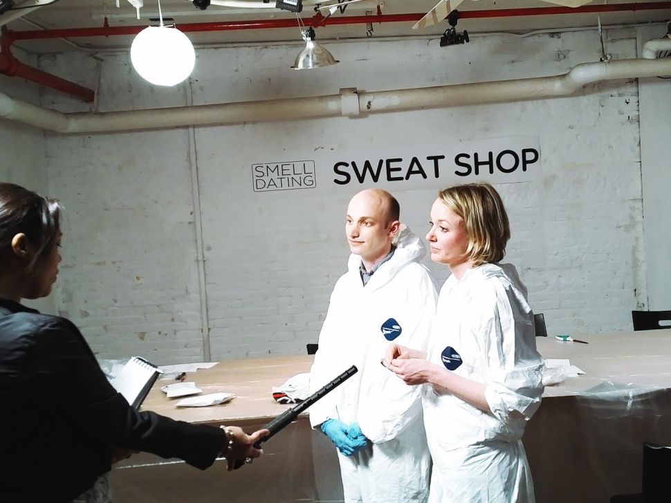 Sam Lavigne and Tega Brain, interviewed by Reuters at the Smell Dating sweat shop.