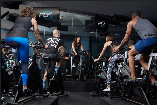 Flywheel's stadium seating allows everyone to see the instructor, even if they're not in the front row