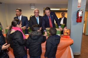 State Senator Adriano Espaillat, left, with Assemblyman Guillermo Linares, center, and Gov. Andrew Cuomo, right.