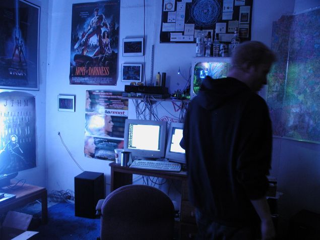 A hacker in his office, from Wikipedia.