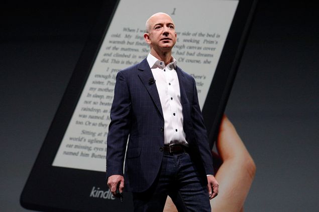 SANTA MONICA, CA - SEPTEMBER 6: Amazon CEO Jeff Bezos unveils new Kindle reading devices during a press conference on September 6, 2012 in Santa Monica, California. Devices include the front-lit Kindle Paperwhite and the Kindle Fire HD in 7 and 8.9-inch sizes.