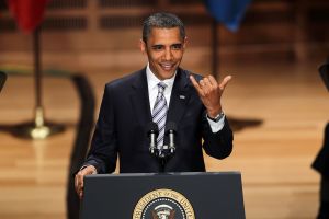 President Barack Obama calls out to a fellow Hawaiian cadet while giving the 130th graduation commencement address at the U.S. Coast Guard Academy on May 18, 2011 in New London, Connecticut.